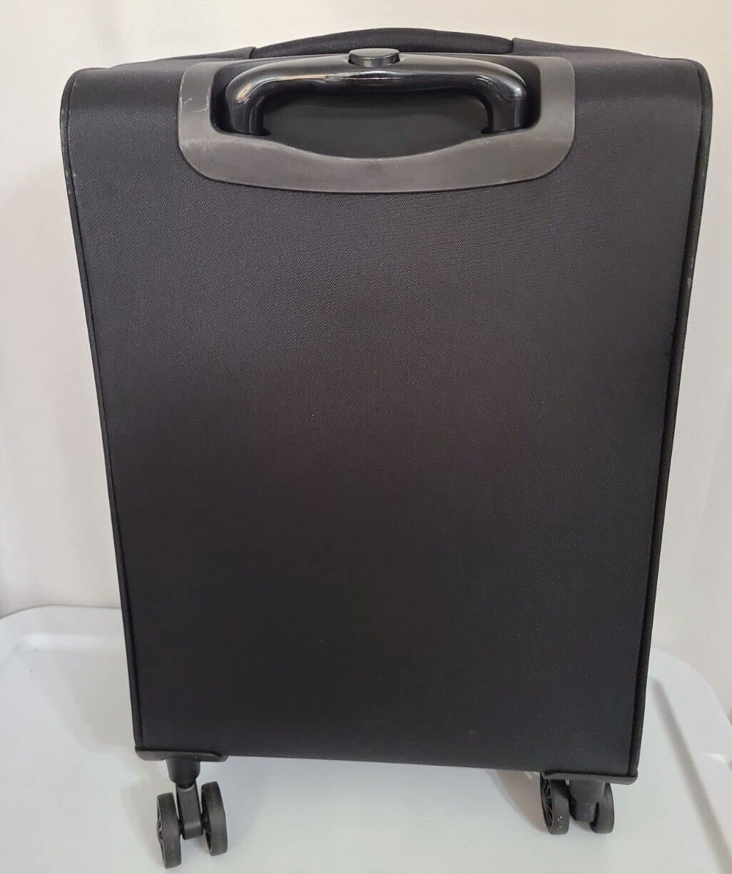 Samantha Brown 22" Upright Spinner Luggage